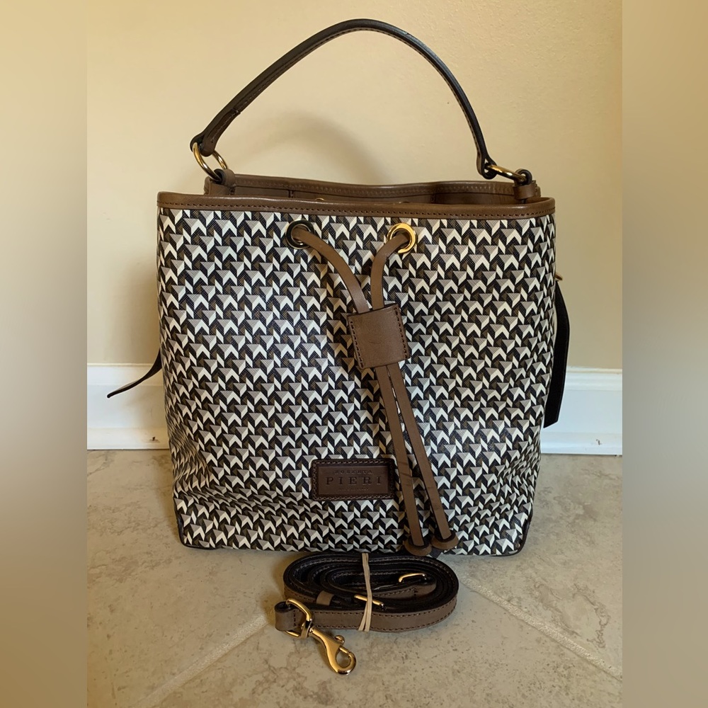 ROBERTA PIERI Drawstring handbag with matching cosmetic bag.